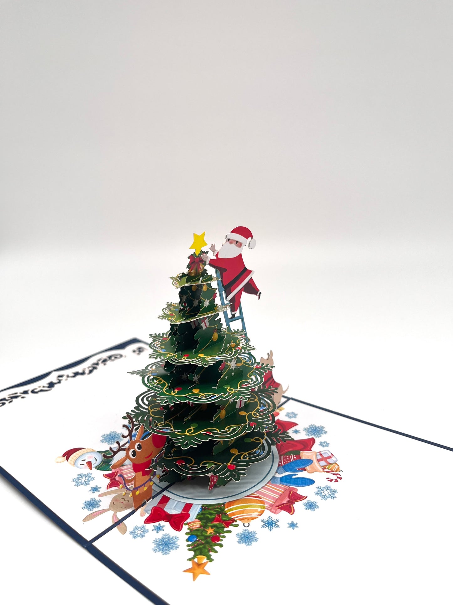 Tannenbaum schmückender Weihnachtsmann 3D Pop-Up