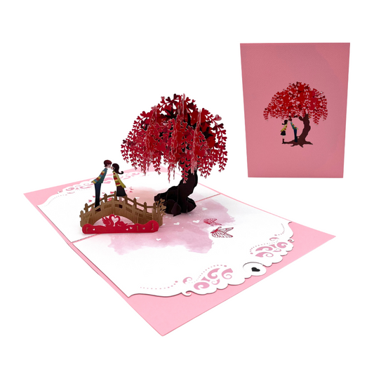 Küssendes Paar auf einer Brücke mit Herzblüten 3D Pop-Up
