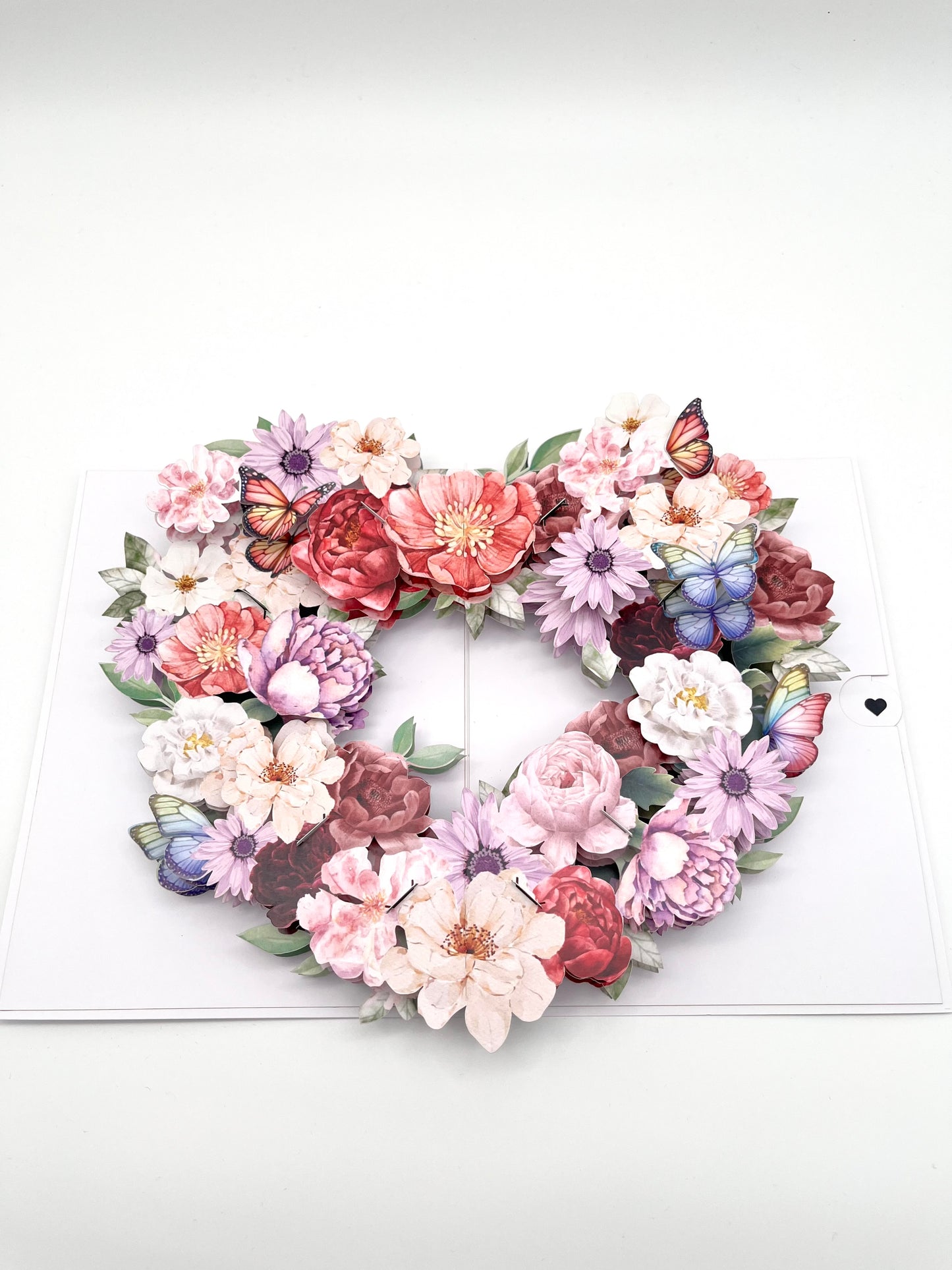 Herzförmiger Blumenkranz mit Schmetterlingen 3D Pop-Up