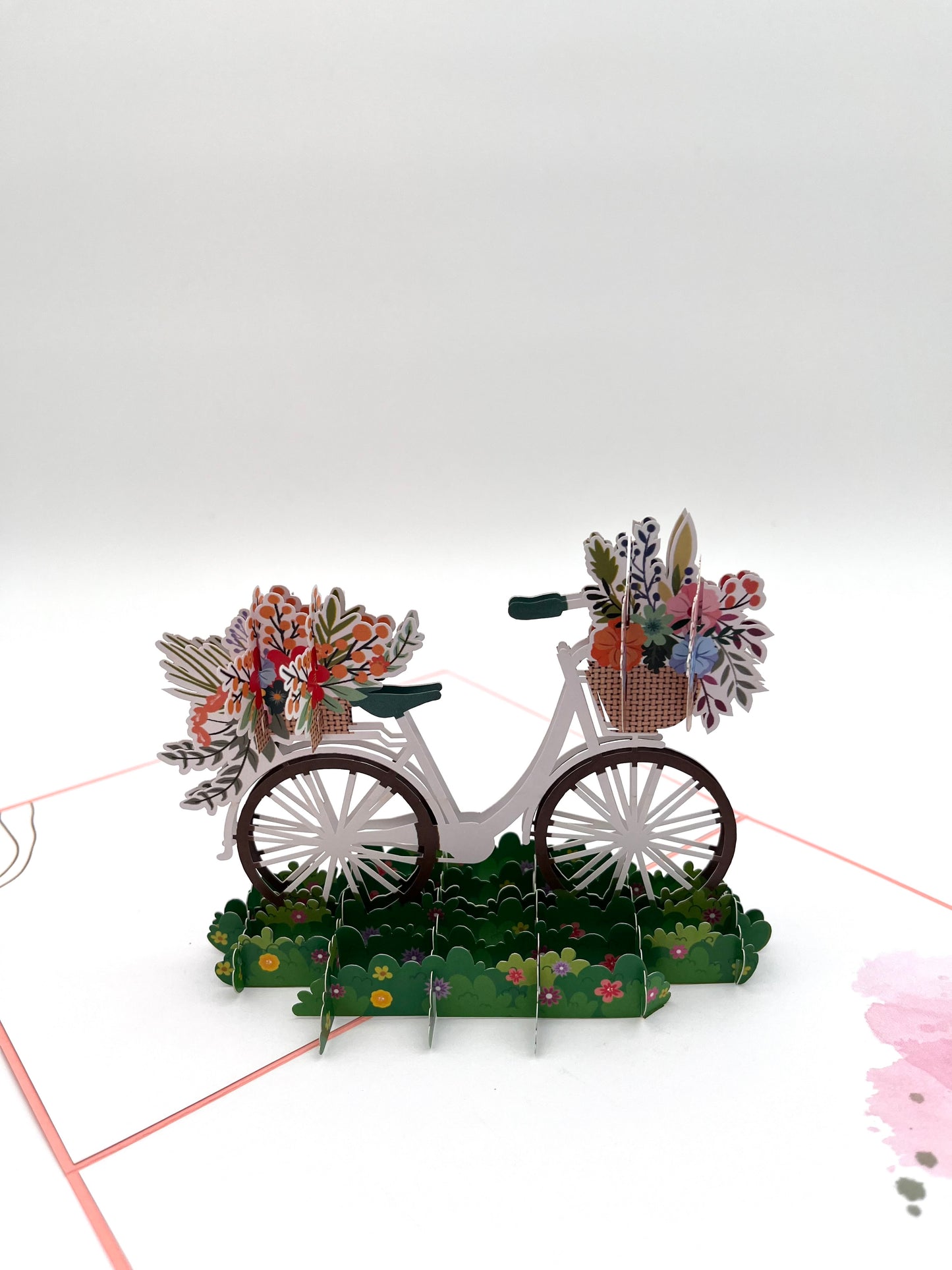 Fahrrad mit Blumenkorb auf der Wiese 3D Pop-Up