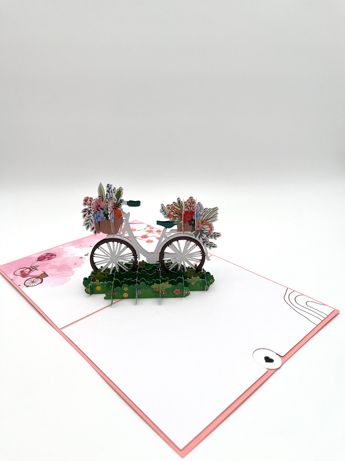 Fahrrad mit Blumenkorb auf der Wiese 3D Pop-Up