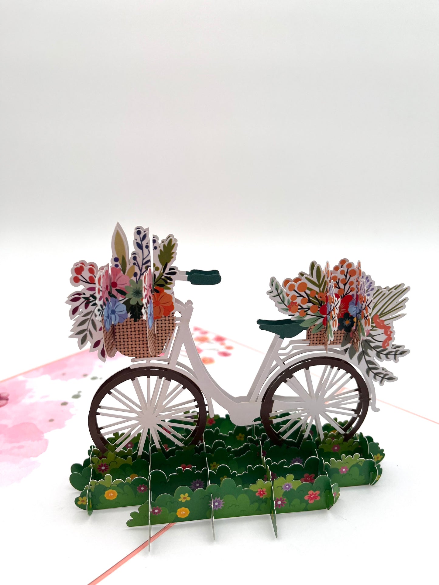 Fahrrad mit Blumenkorb auf der Wiese 3D Pop-Up